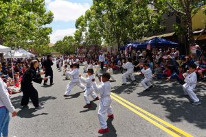 Kids giving skill demo in street